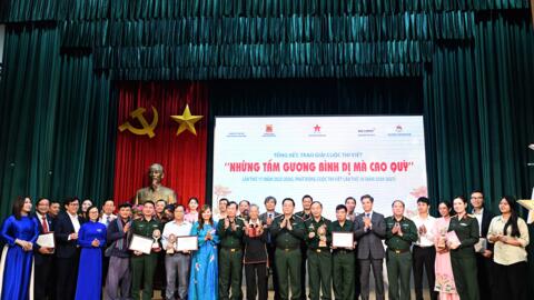 Tôn vinh và nhân rộng những tấm gương bình dị mà cao quý