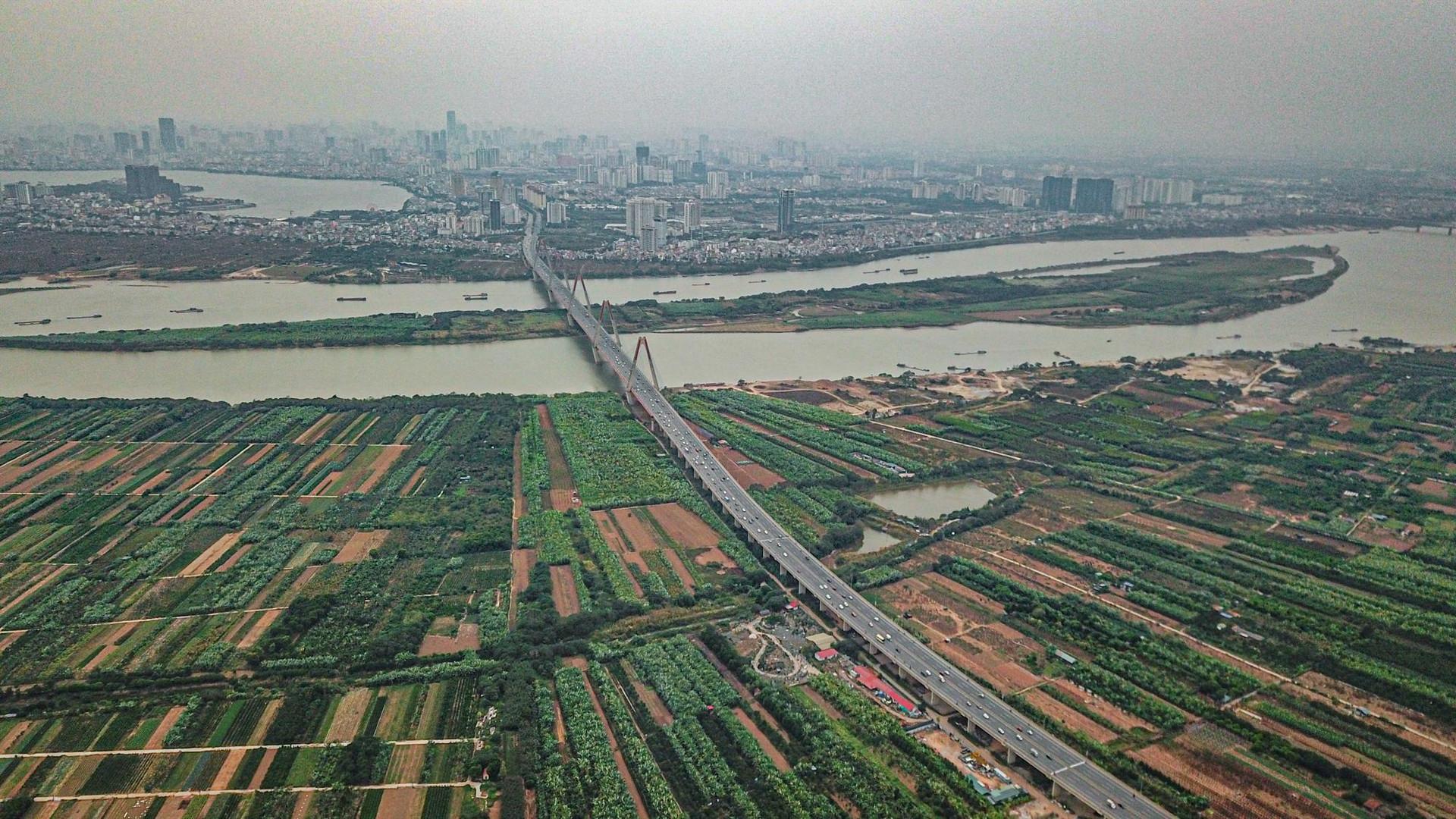 [Photo Essay] Đông Anh chuẩn bị lên quận, giá nhà đất vẫn "im lìm" - Ảnh 1.