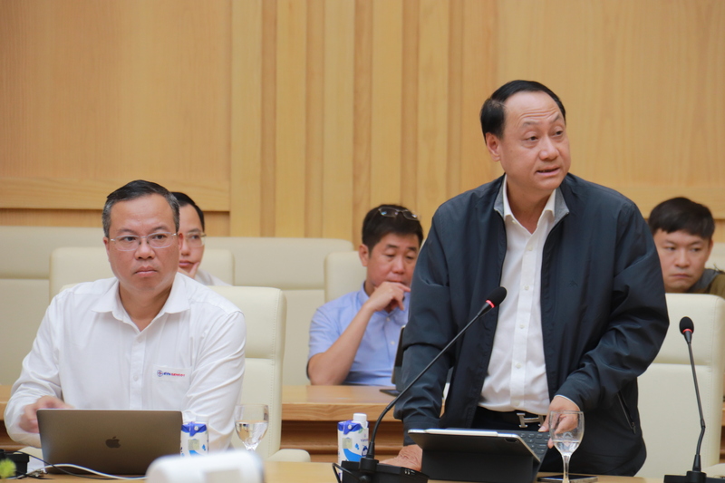 Đại diện Tổng công ty Điện lực TP. Hà Nội báo cáo tại cuộc họp